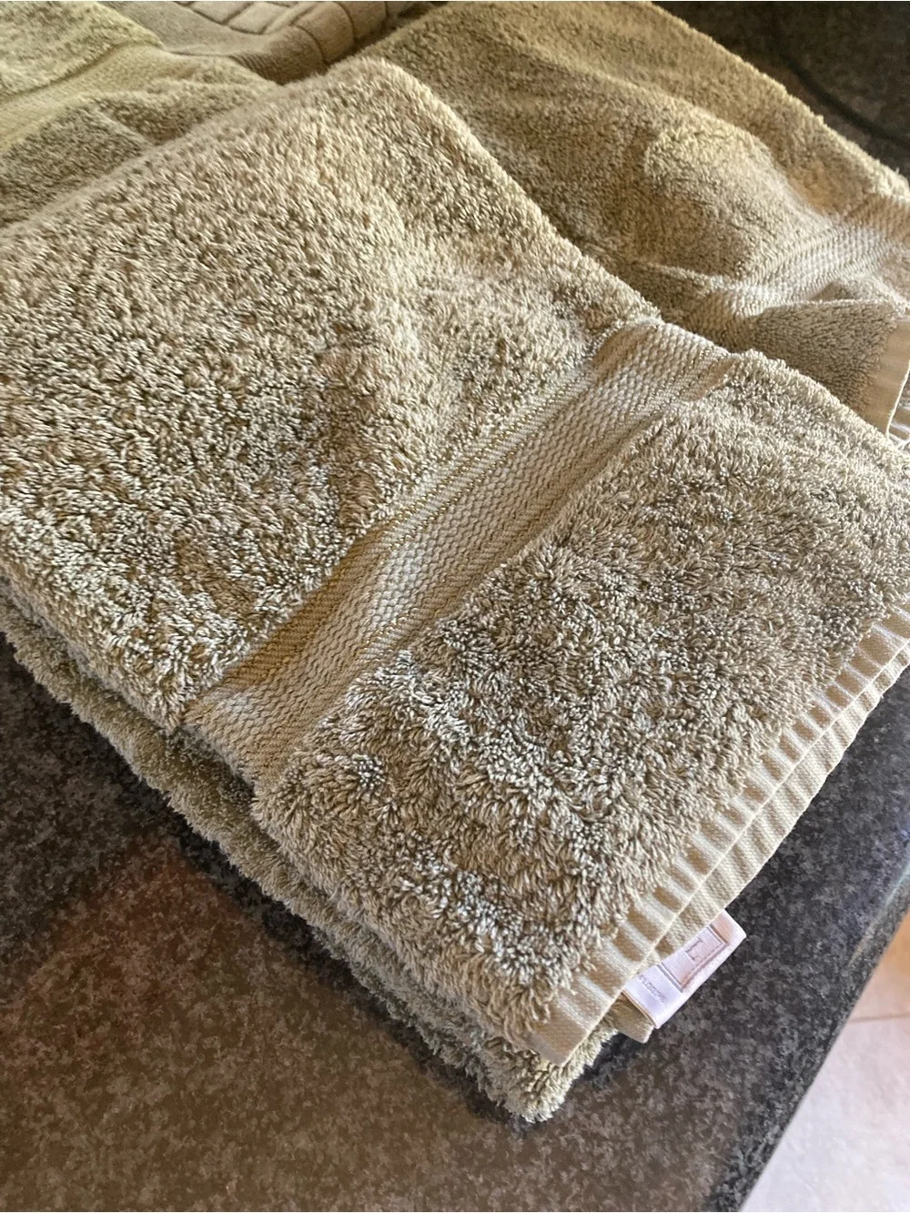 2 Croscill towels, 3 hand towels and 1 bath mat.